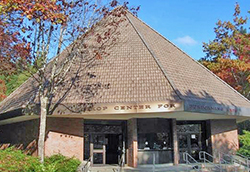 exterior of the Bishop Center on a sunny fall day