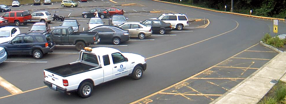 white campus security truck patrolling the upper campus on a snowy morning