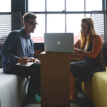 A tutor working with a student