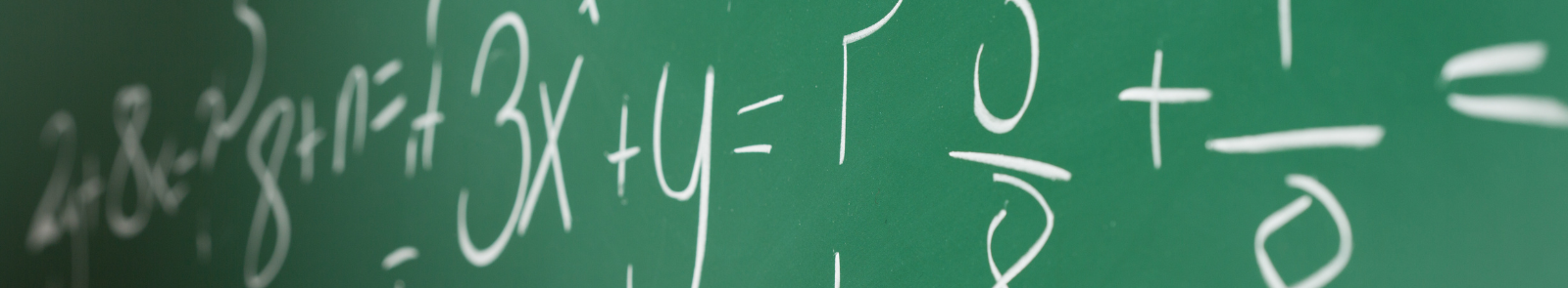 A green chalkboard with various linear equations witten on it. 