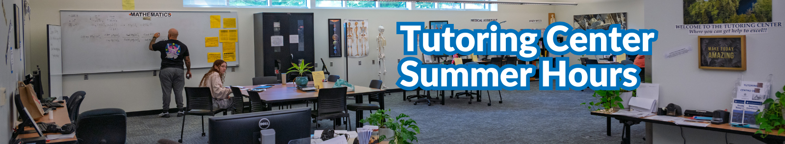 The interior of the GHC tutoring center on the bottom floor of the library, someone is writing math equations on the whiteboard and a person working at a table. Text to the right side of the image reads “Tutoring Center Summer Hours”
