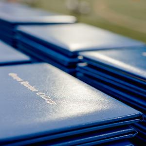 A stack of degrees to be handed out at the graduation ceremony