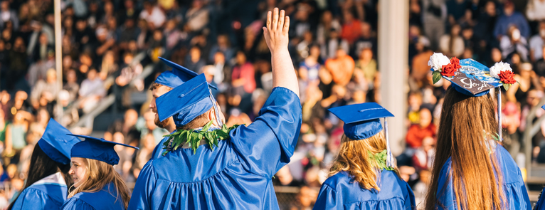 Photos of grads walking across the field at graduation and an application to a University. Text reads, Winter Transfer Fair – start here, go anywhere!