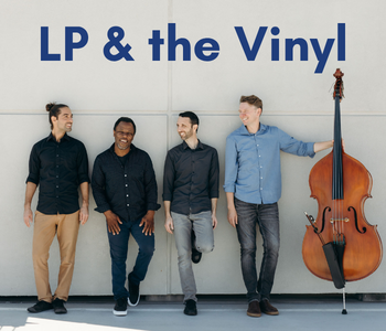 "LP and the Vinyl" posed in a line along a white wall. The rightmost member is holding up a bass.