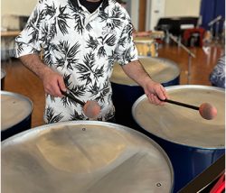 A person playing steel drums